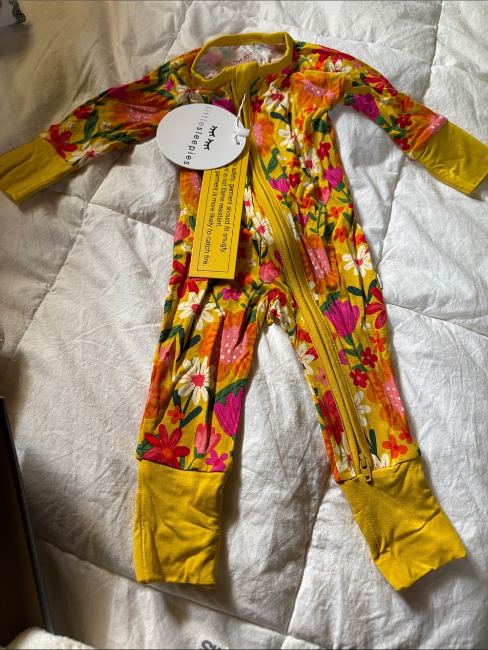 Little Sleepies Floral Zip Footie in Mustard Yellow and Pink